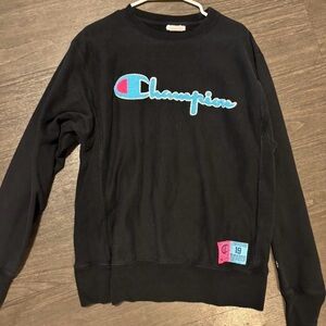 Champion Black Sweatshirt with Blue and Pink Logo